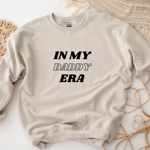 a sweater with the words in my daddy era printed on it