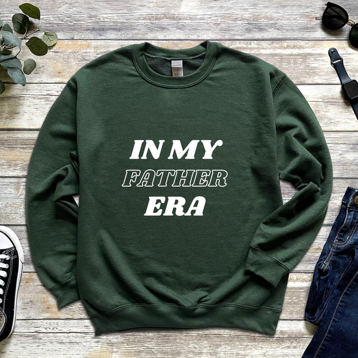 a green sweatshirt with the words in my father era printed on it