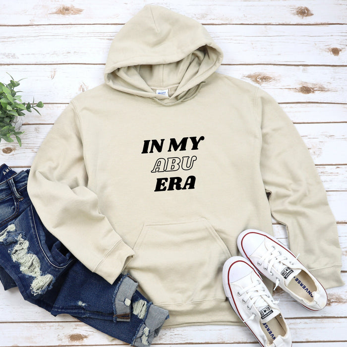 a sweatshirt with the words in my aru era printed on it