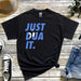 a t - shirt that says just dua it next to a pair of jeans