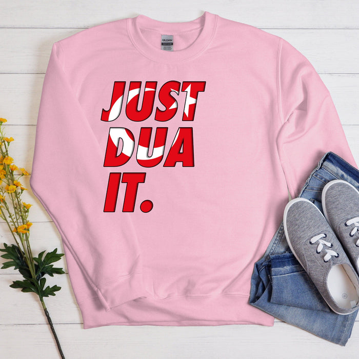 a pink sweatshirt with the words just dua it on it