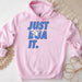 a pink hoodie that says just dua it