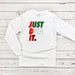 a white shirt that says just dua it