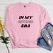 a pink sweatshirt with the words in my father era on it