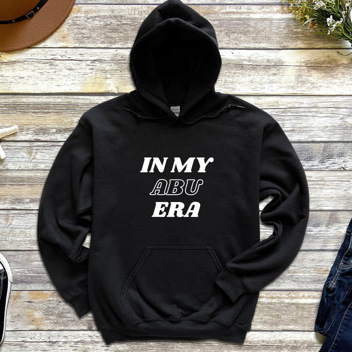 a black hoodie with the words in my abu era printed on it