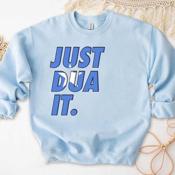 a blue sweatshirt that says just dua it