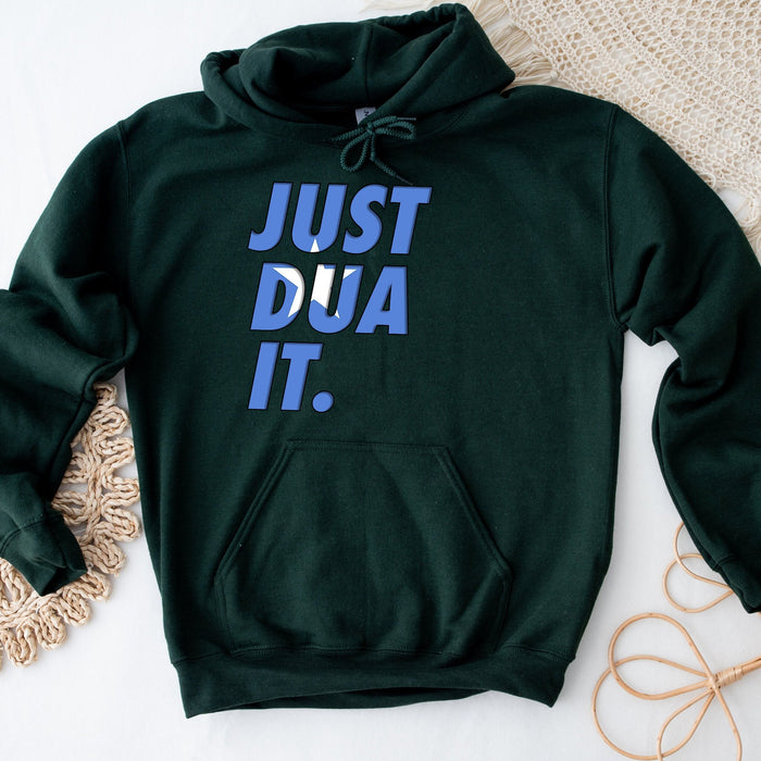 a green sweatshirt with the words just dua it on it