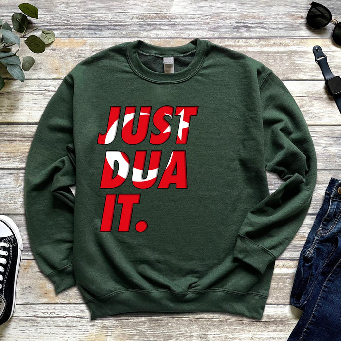 a green sweatshirt that says just do it