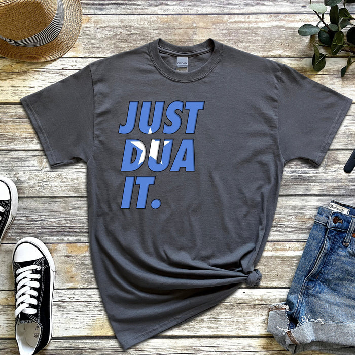 a t - shirt that says just dua it next to a pair of jeans