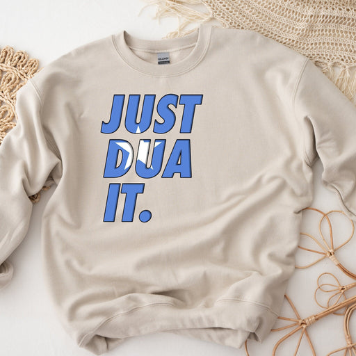 a sweater that says just dua it on it